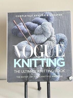 Vogue Knitting Book with Gray and Light Blue Yarn